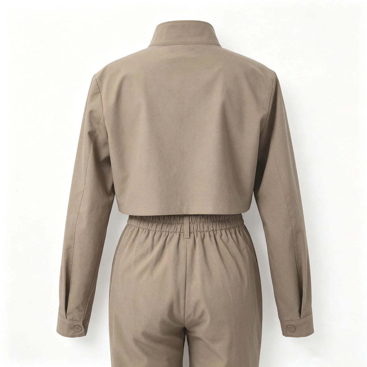 Conjunto vintage com modelagem que afina a cintura, blusa cropped de manga comprida e zíper.